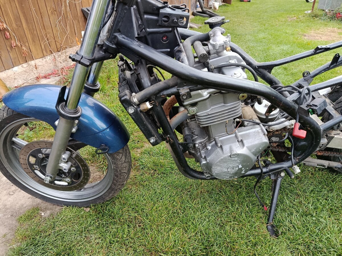 Kawasaki er5 dily - 2