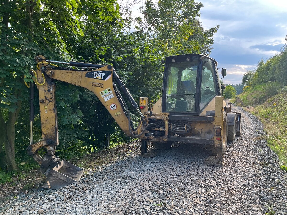 Caterpillar 428e traktorbagr - 2