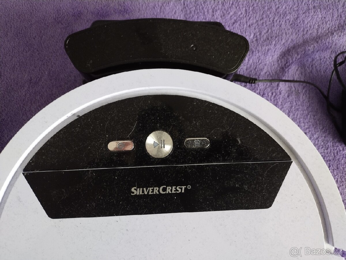 Robotický vysavač. - 2