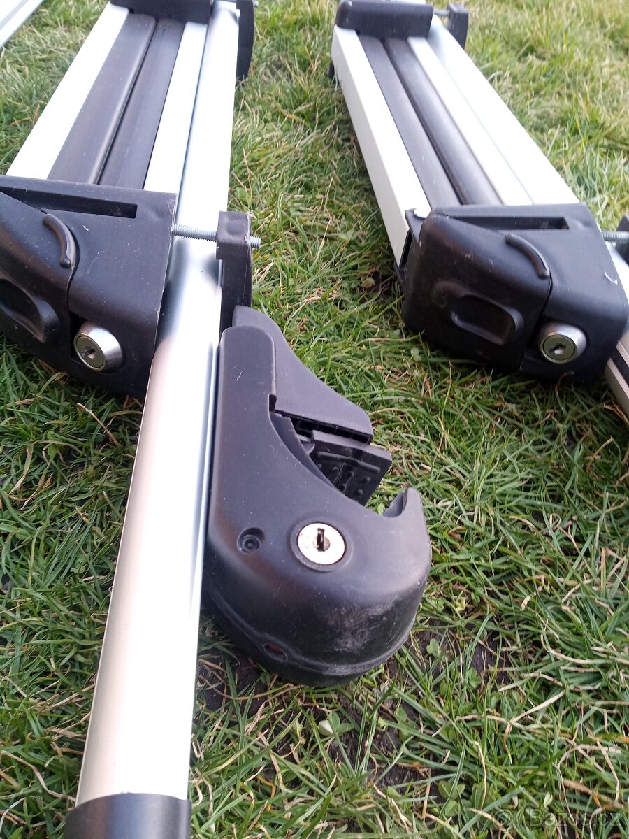 SLEVA nosiče, příčníky, držáky kol. - 2