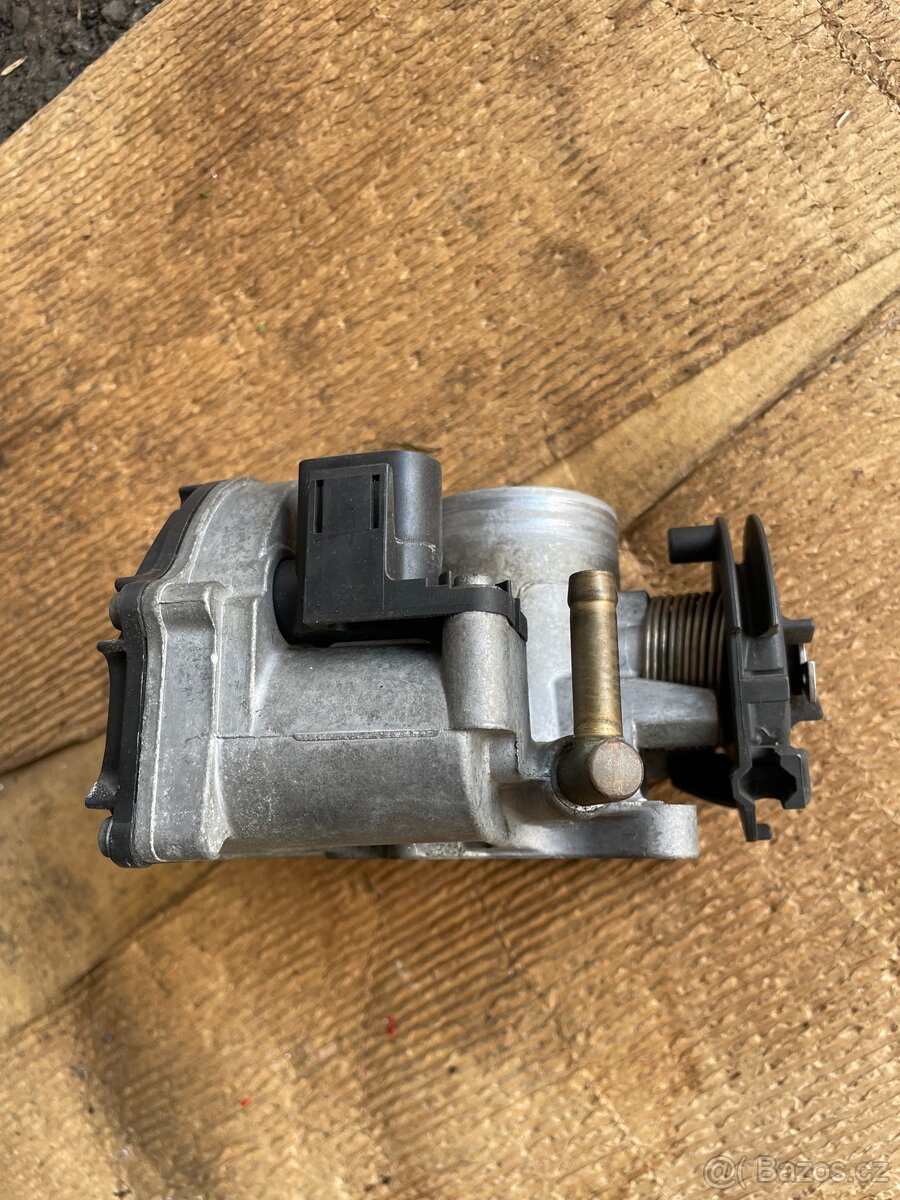 Škrtící klapka Polo 6n - 2