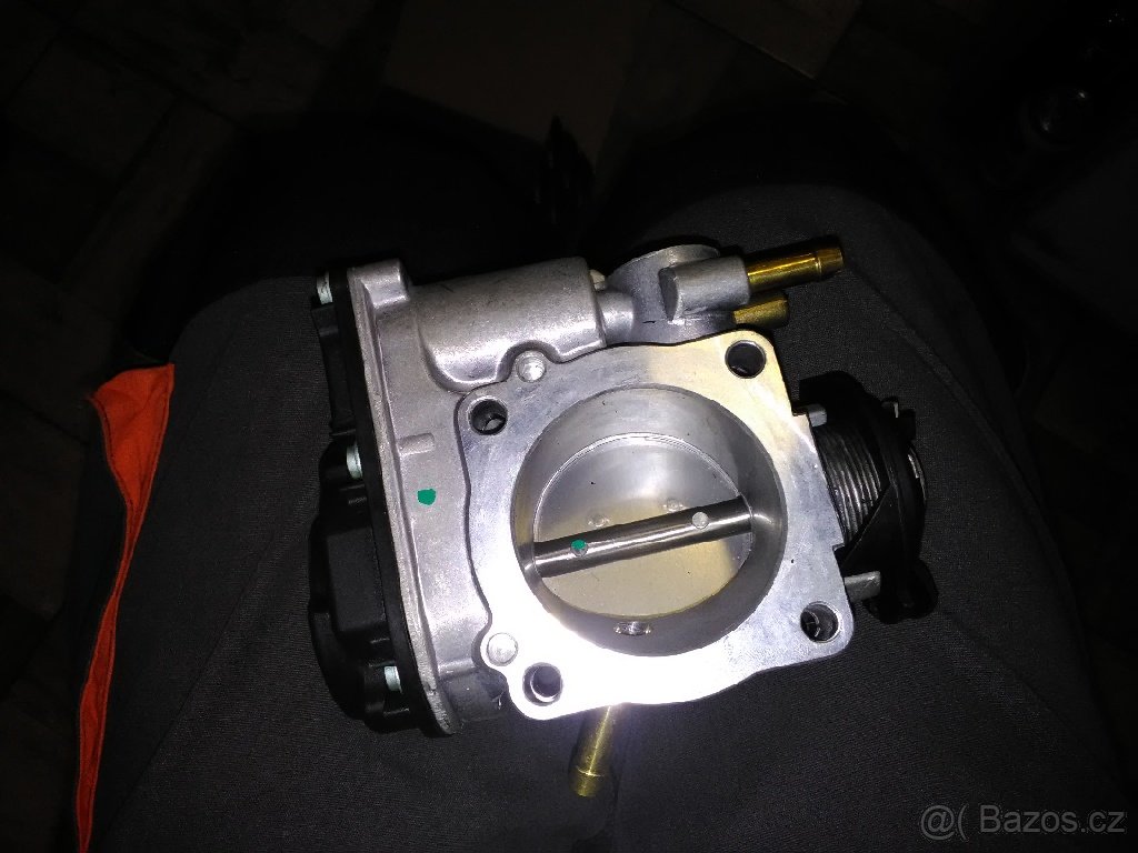 škrtící klapka Octavia 1 - 2