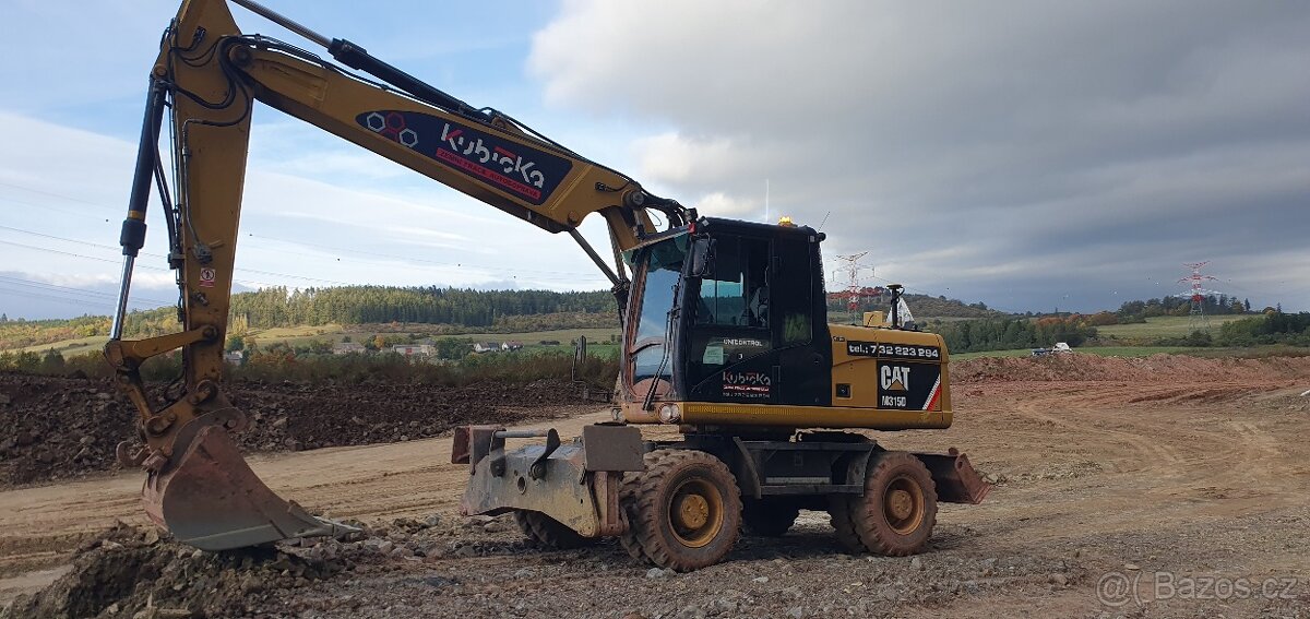 Kolový bagr Cat 315D - 2