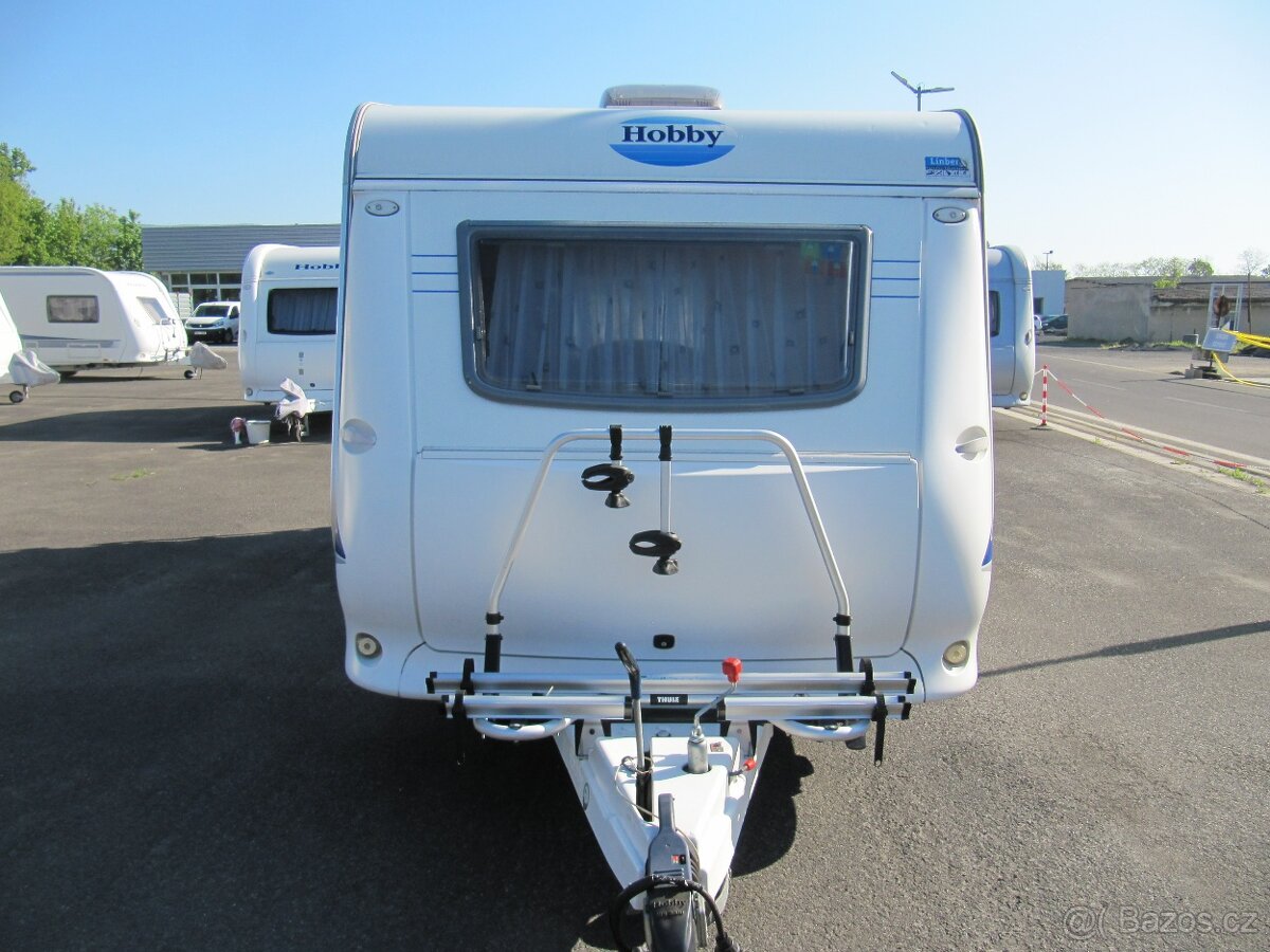 Prodám karavan Hobby 450 sf,r,v..2005 + mover + klima + stan