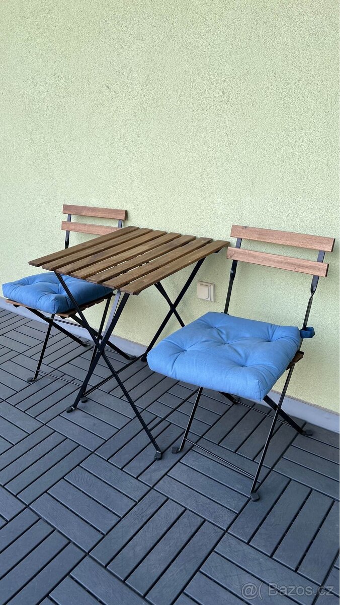 Foldable table and chairs with cushions. - 2