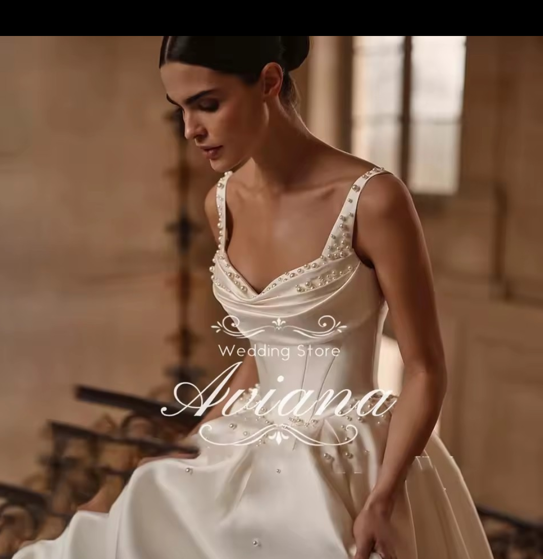 Krásné svatební šaty s perlami - 2