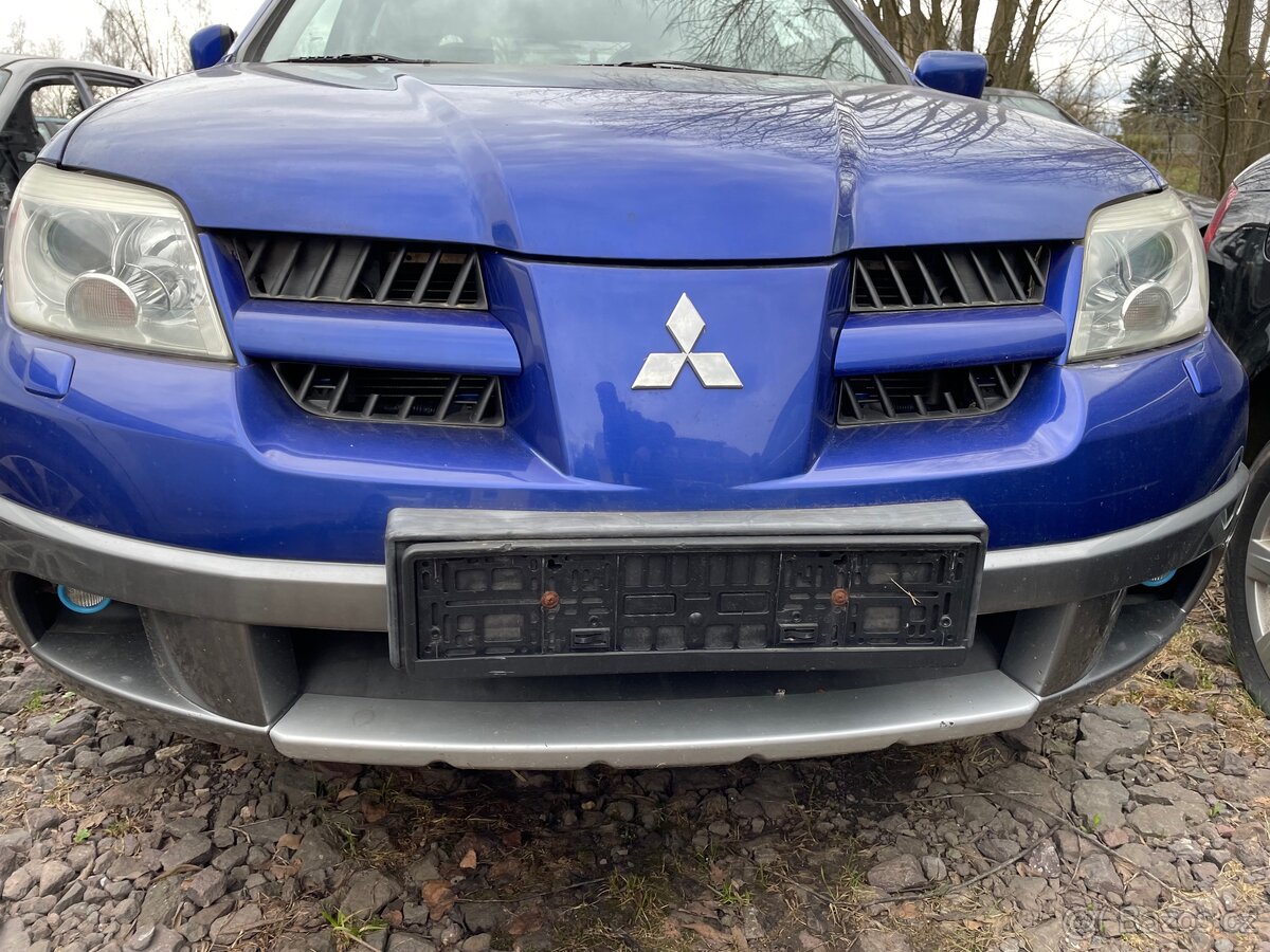 Kapota Mitsubishi Outlander I - 2