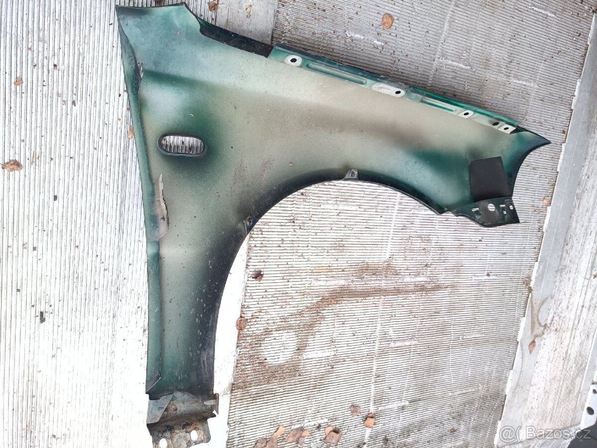 PŘEDNÍ BLATNÍK VW PASSAT B5,5 - 2