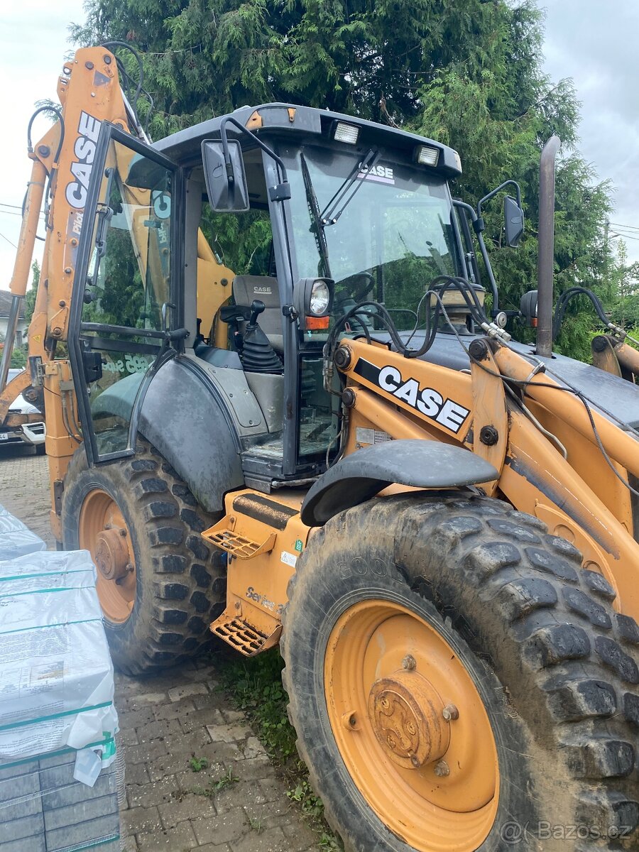 Traktorbagr Case 695 SuperR - 2