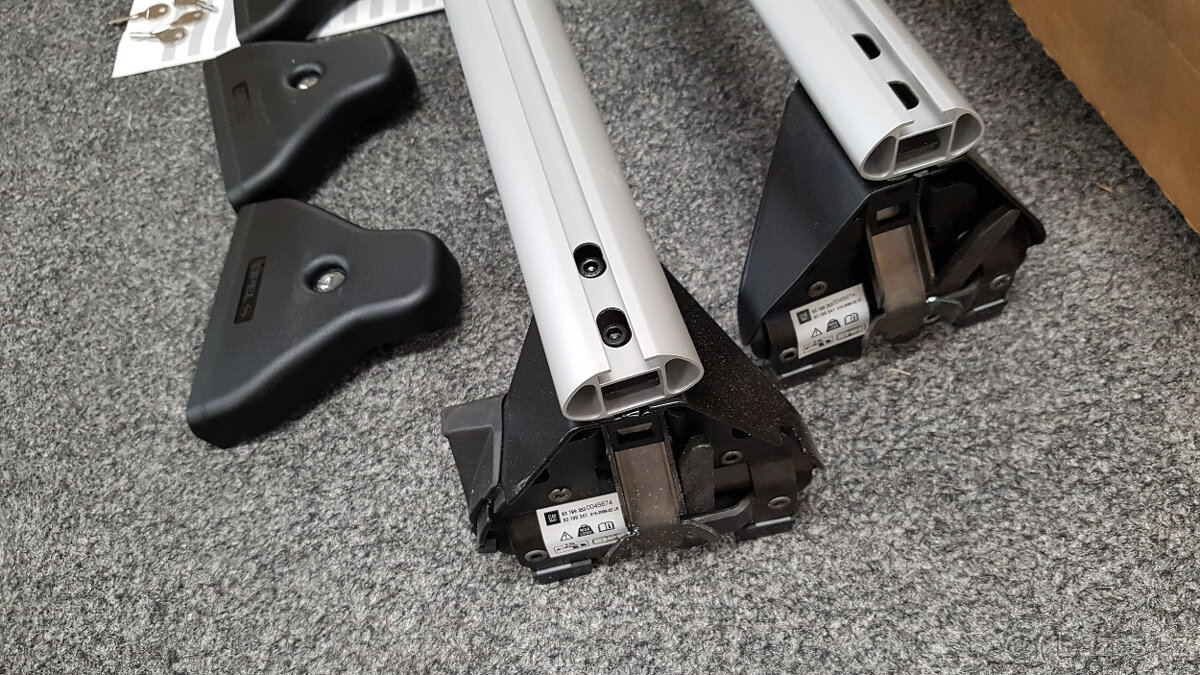 Příčníky Opel Corsa D, Corsa E, nové, originál - 2