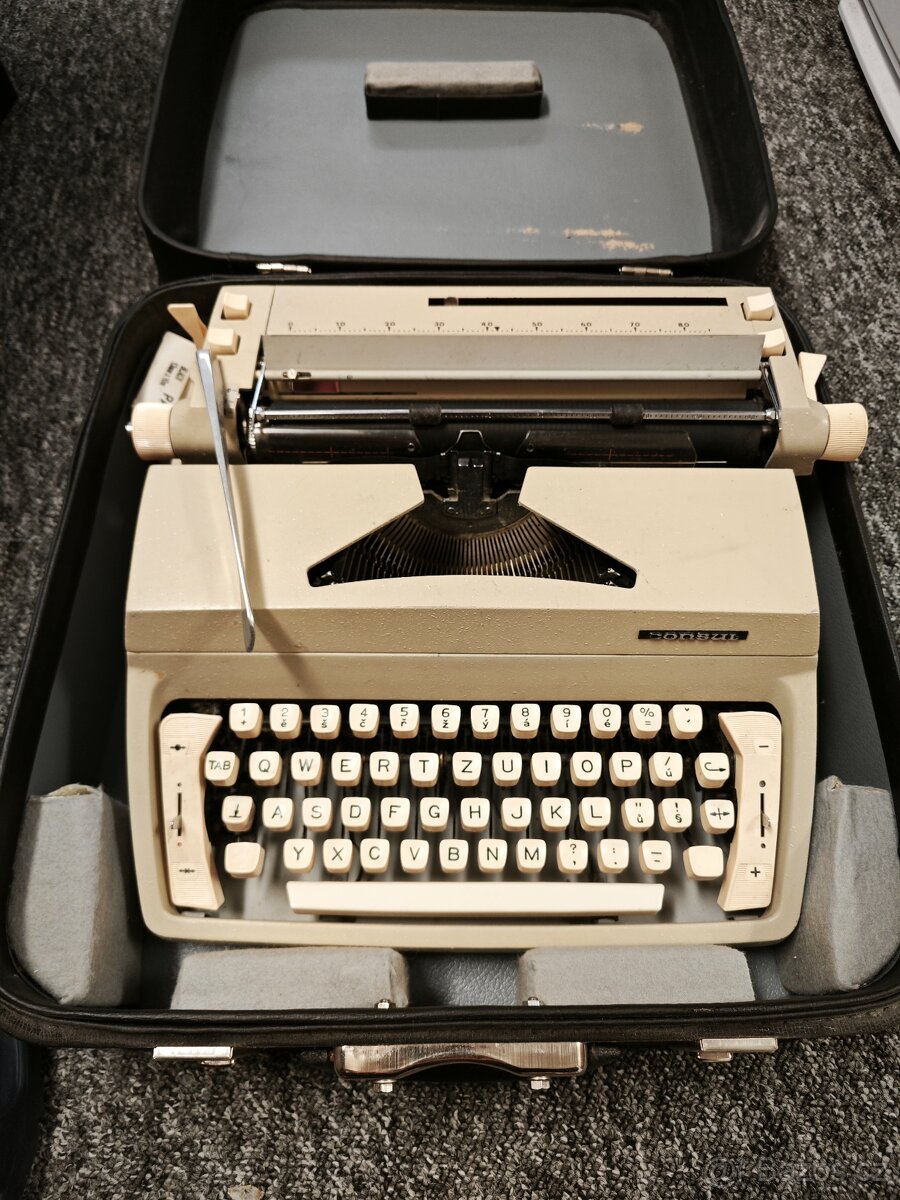 Kufříkový psací stroj Consul. - 2