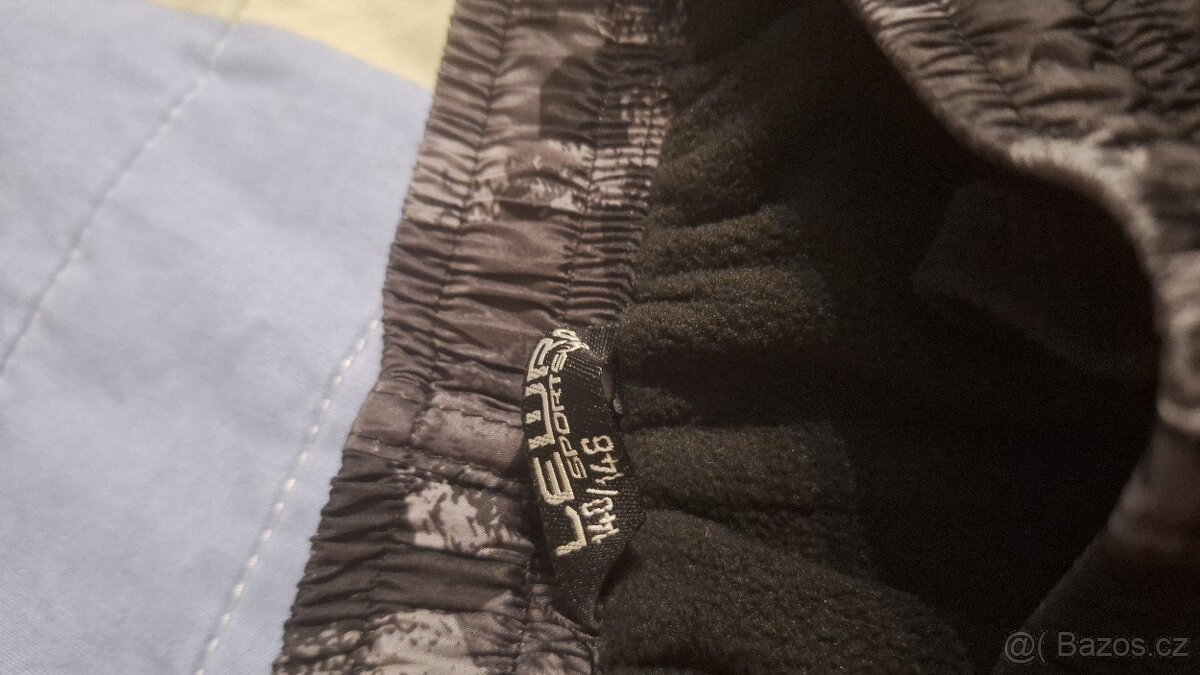 Prodám zateplené šusťaky 140-146 - 2