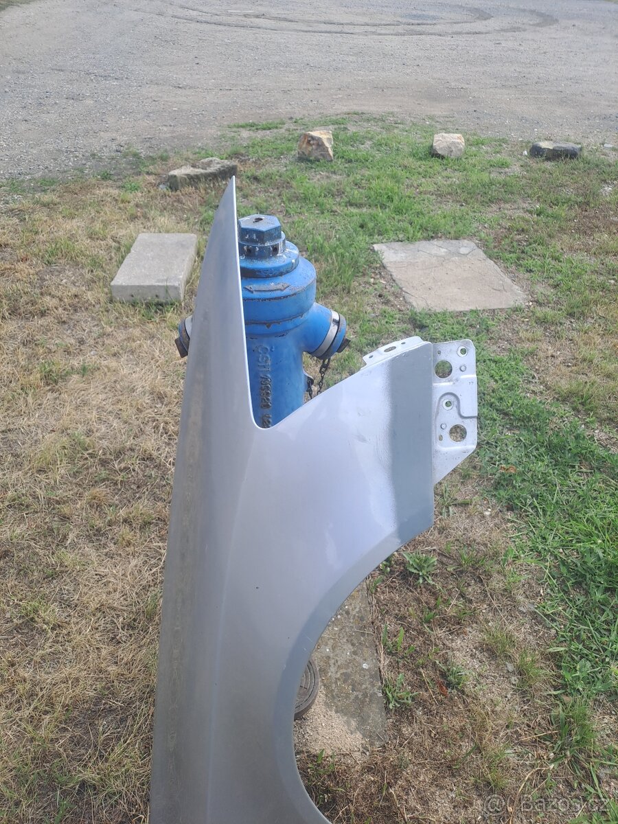 Audi A6 C6 blatník - 2