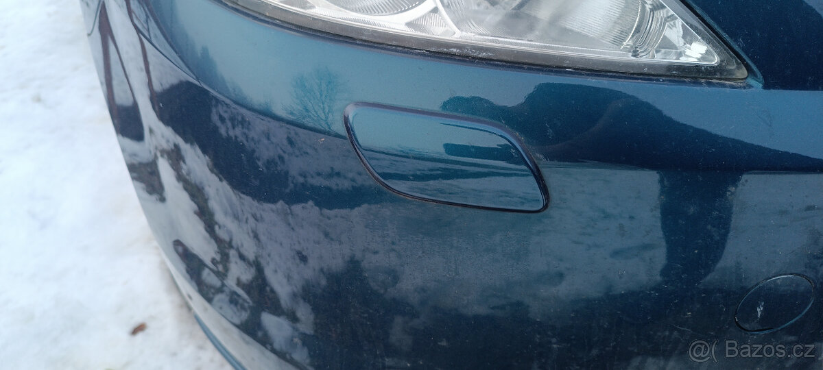 Krytka ostřikovače světlometu - 2