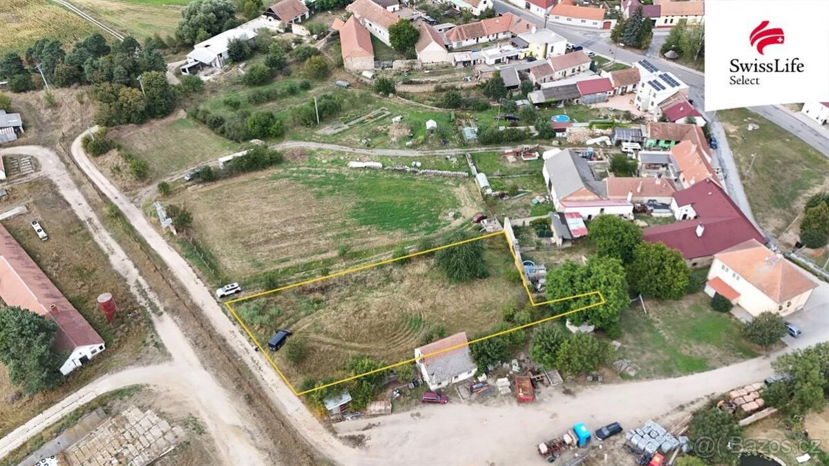 Prodej stavebního pozemku 1858 m2, Hostim - 2