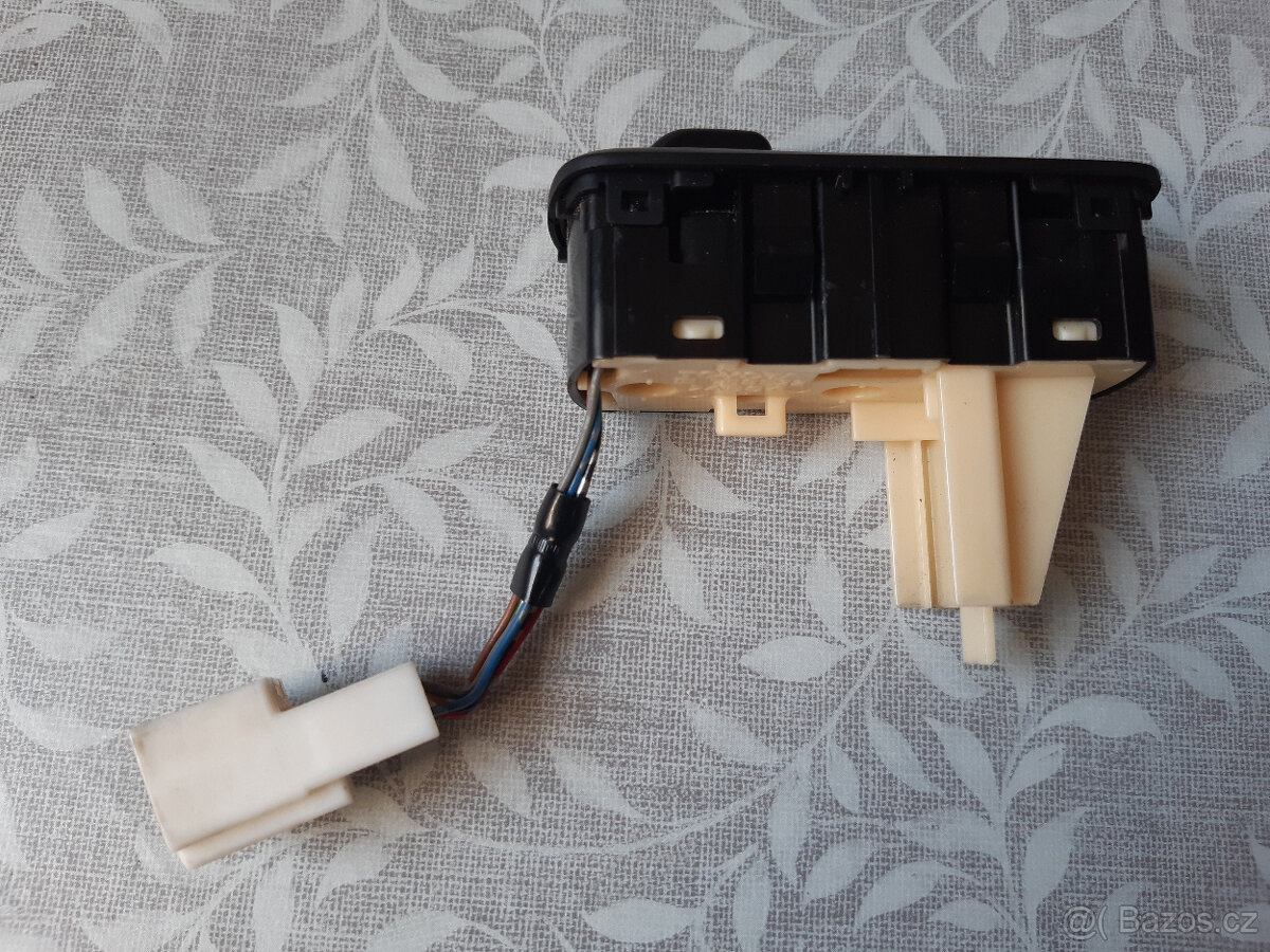 Ovladač hydraulického podvozku (AHC)