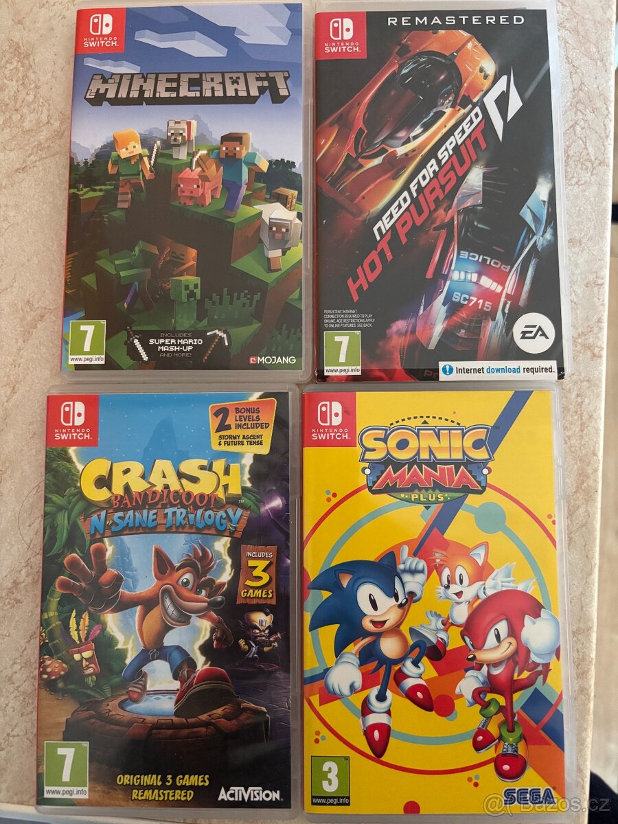 Nintendo Switch Lite Turquoise (světle tyrkysová) + 4 hry - 2