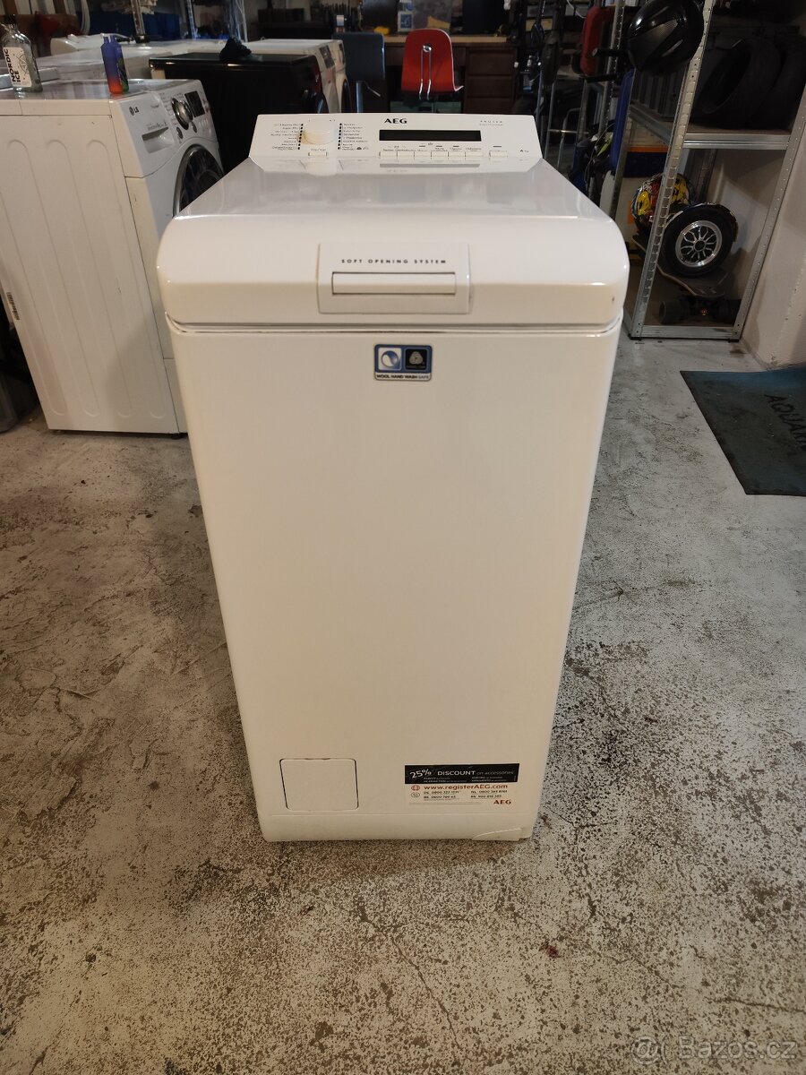 Vrchem plněná pračka AEG - 2