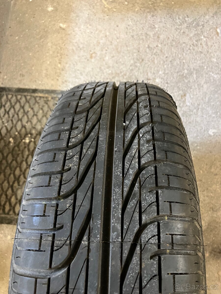 Disk originál Ford, pneu 185/65 R14 - 2