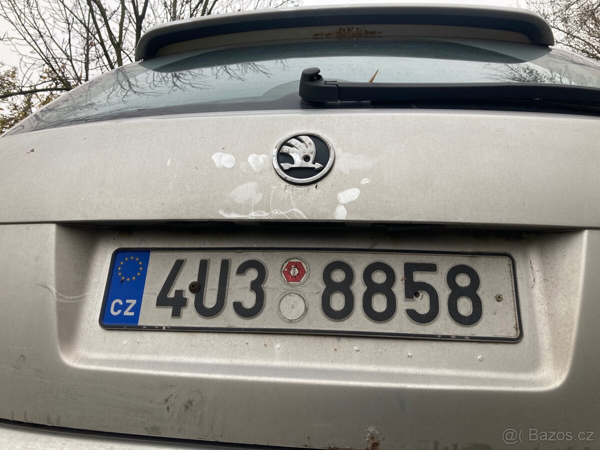 Prodám zadní stříbrné dveře s křídlem Škoda Fabia GT - 2