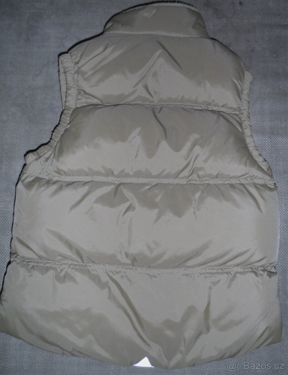 Teplá vesta vel. 134 - 2