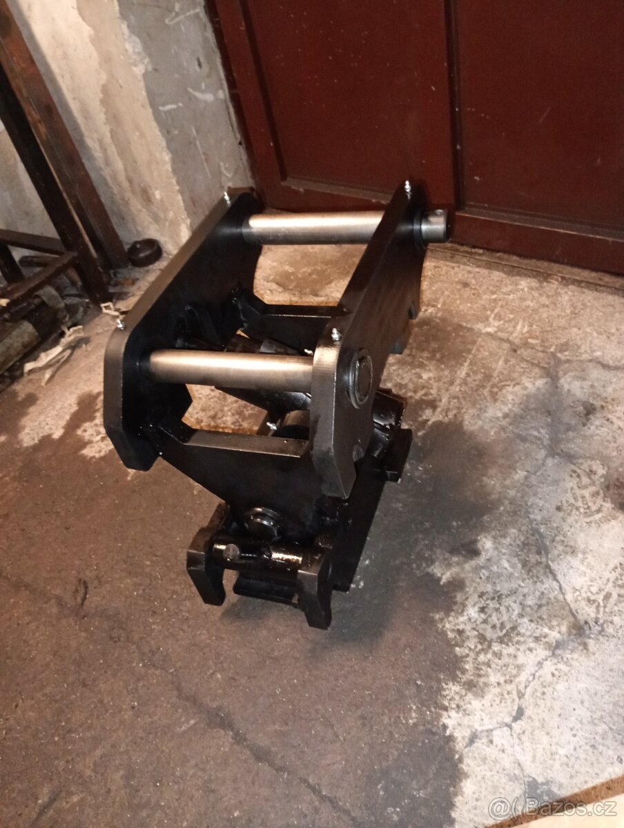 Naklápěcí hlava Caterpillar, pístová 2x45' - 2