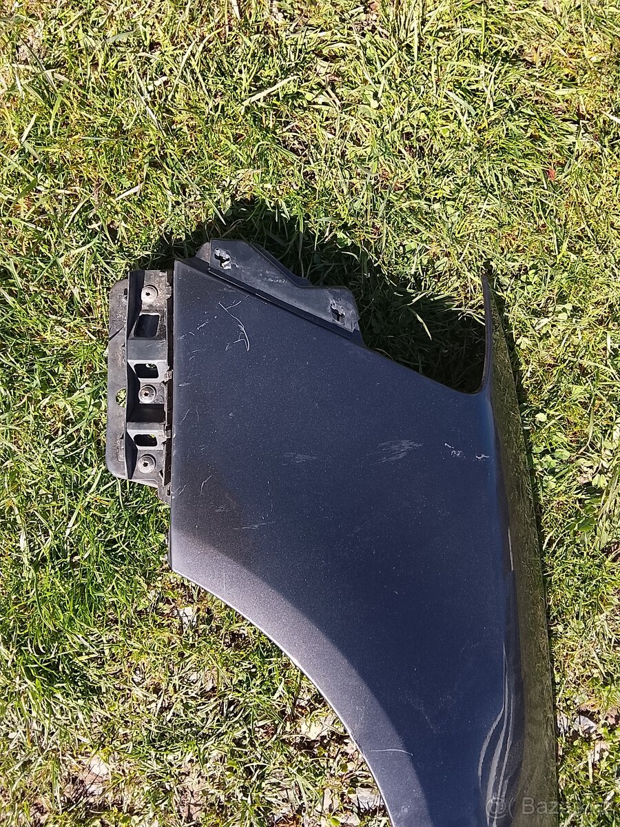 Levý blatník Passat b6 - 2