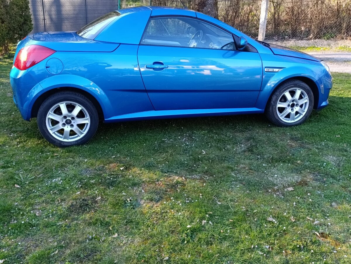 Opel Tigra twin top 1,4i.(66kw). - 2