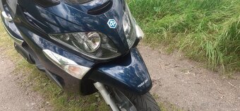 Piaggio X evo 125 - 20