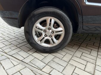 Kia Sportage 2.0i 104kW 4WD - 20