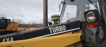 Traktor.- bagr Caterpillar 428B - 20