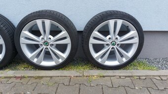 Alu kola 5x112 r18 Neptune originál Škoda Octavia II - 2