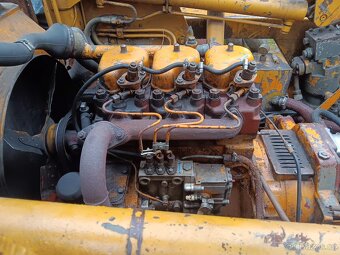 Smykový nakladač unc 060+podkop+vidle - 2