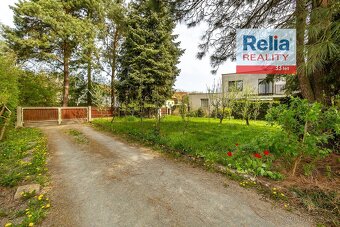 Prostorný RD s garáží v klidné části obce Břehy, 952 m2 - 2