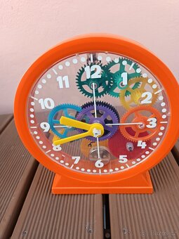 Skládací hodiny NDR s návodem v původní krabici. - 2