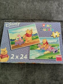 Puzzle"Medvídek PÚ"2x24, 1 knížka a dinosauři - 2