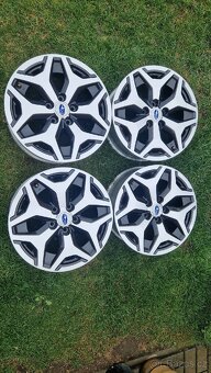 Prodám sadu originálních alu disků - kol Subaru J17 x 7J - 2