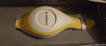Medela manuální odsávačka,7 lahví na ml. - 2
