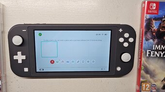 Nintendo Switch Lite + 2hry - 2