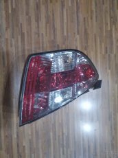 Prodam levé zadní nové svetlo origo Fiat Stilo 3 dveř. - 2