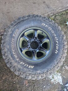 Alu disky Mitsubishi rozteč 6x139.7 a pneu 32x11.5 R15 - 2