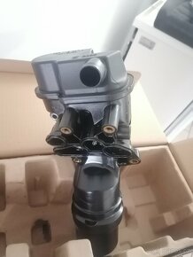 Drzak filtra ,oil housing 2.0 TFSI 06f115397 H - 2
