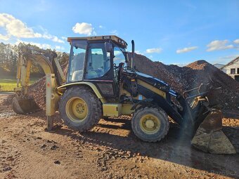 Traktorbagr Caterpillar 428D 4X4 + sbíjecí kladivo - 2