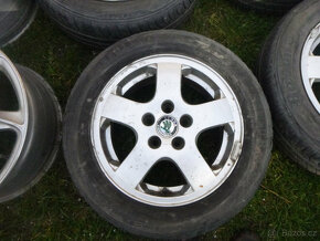 4x alu disky škoda (5x100) letní pneu 185/60 r14 - 2
