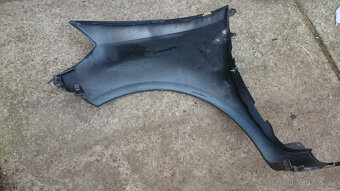 Clio 3 Pr.Př. blatník - 2