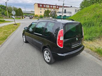 Skoda roomster 1.4i 63kw - 2