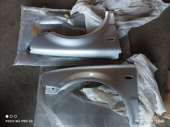 Pravý a levý přední blatník Passat B5.5 - 2