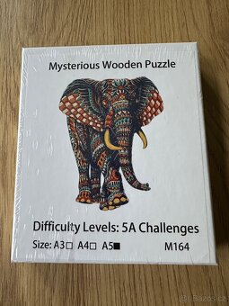 Dřevěné puzzle - kočka, slon, páv, papoušek - 2