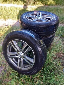 Prodám 4 hliníkové ráfky s 185/65 R15 91H m+s na Hyundai i30 - 2