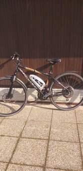Crossové kolo KELLYS s elektropohonem BIONX - 2